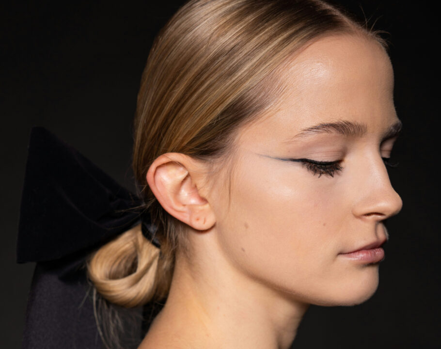 side profile of woman with winged eyeliner