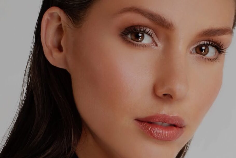 Model with doe-eyed makeup and soft glam look